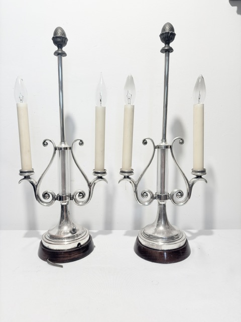 Pair of lyre shaped table lamps each lamp holds two lights either side of a ribbed glass column (c.1940)