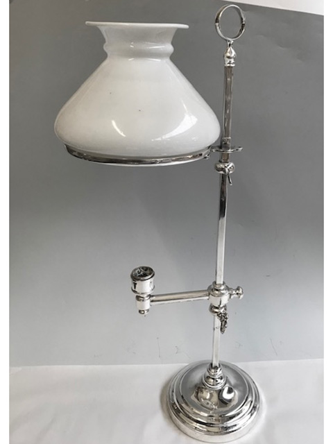 Antique silver plated student lamp with loop handle the candle holder and the original glass shade can be adjusted up or down