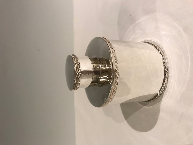 Antique cylindrical silver plated tea caddy mounted in three places with a gadroon decoration (c.1900)