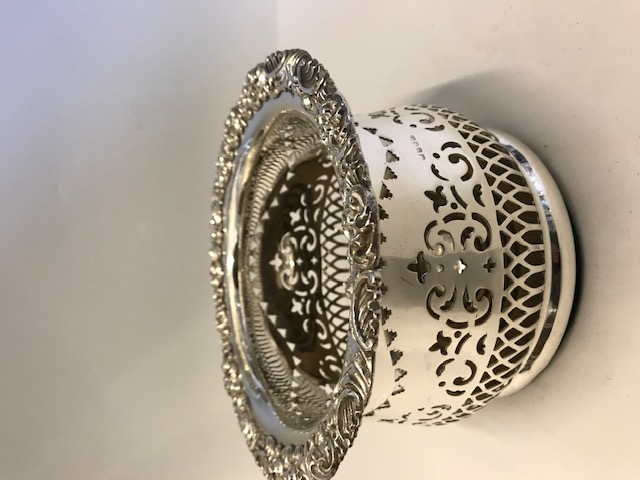 Antique silver plated champagne coaster elaborately mounted with pierced sides (c.1890)
