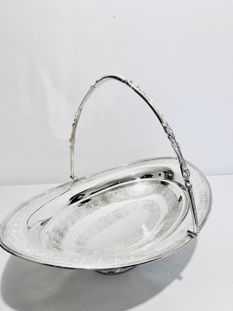 Handsome Oval Antique Silver Plated Cake or Fruit Basket with Elaborate Swing Handle