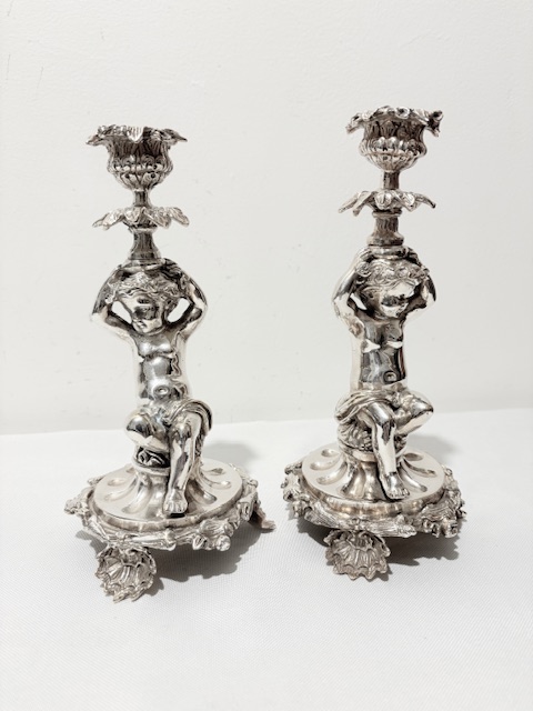 Handsome Pair of Antique Silver Plated Candlesticks on Shell Feet