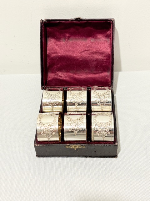 Six Boxed Antique Silver Plated Napkin Rings (c.1890)