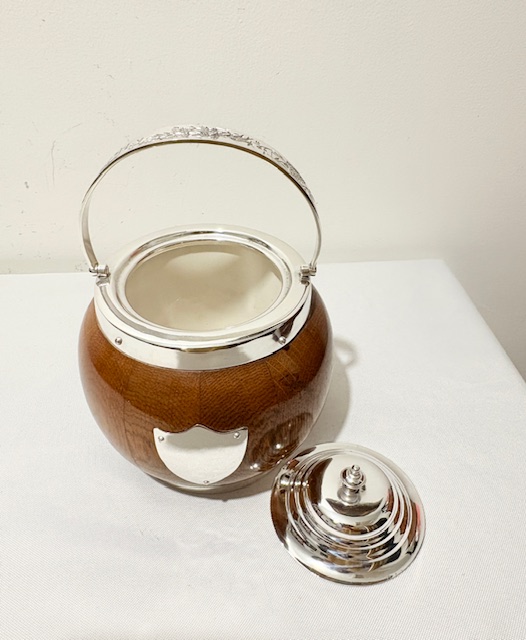 Vintage Silver Plated and Oak Biscuit Box with Bulbous Body Vintage Silver Plated and Oak Biscuit Box with Bulbous Body