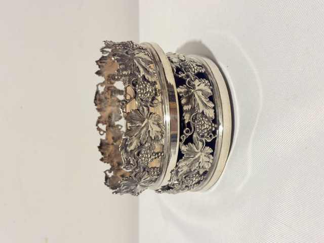 Pair of Antique Silver Plated Wine Decanters or Champagne Bottle Coasters Pair of Antique Silver Plated Wine Decanters or Champagne Bottle Coasters