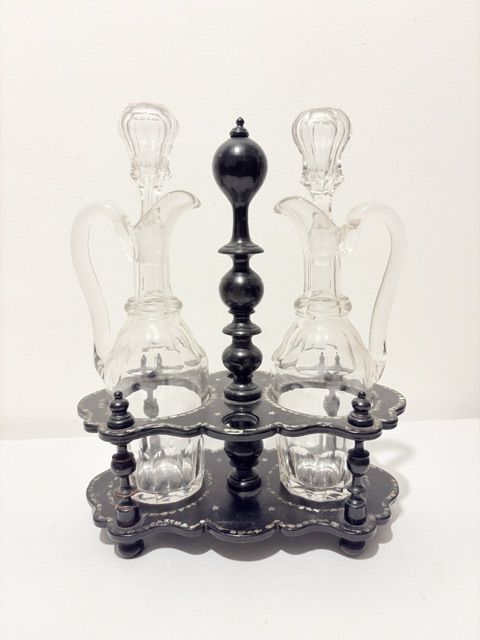 Antique Oil & Vinegar Set Housed in a Black Papier Mache Stand
