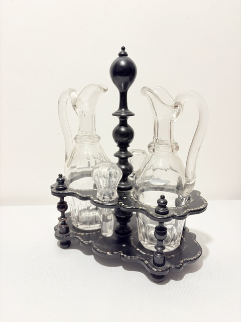 Antique Oil & Vinegar Set Housed in a Black Papier Mache Stand