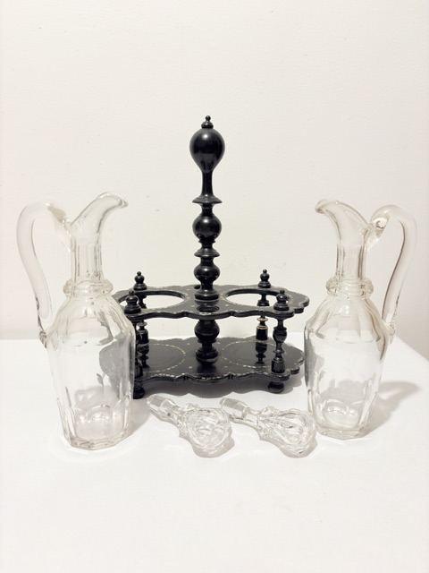 Antique Oil & Vinegar Set Housed in a Black Papier Mache Stand