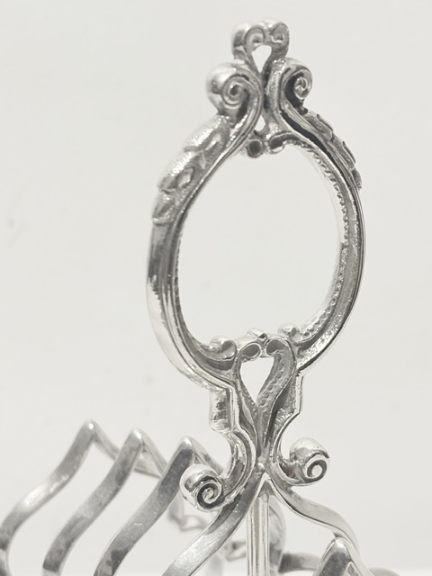 Antique Silver Plated Toast Rack with Central Ornate Handle Antique Silver Plated Toast Rack with Central Ornate Handle