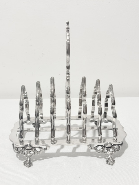 Antique Silver Plated Toast Rack with Central Ornate Handle Antique Silver Plated Toast Rack with Central Ornate Handle