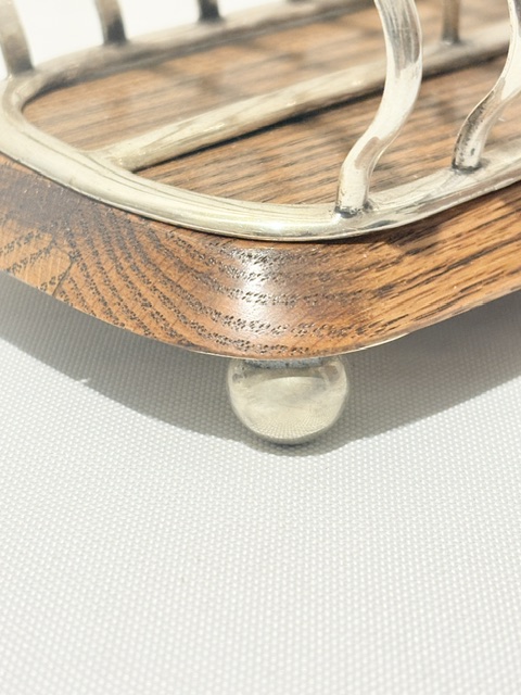 Antique Silver Plated and Oak Toast Rack on Four Ball Feet Antique Silver Plated and Oak Toast Rack on Four Ball Feet